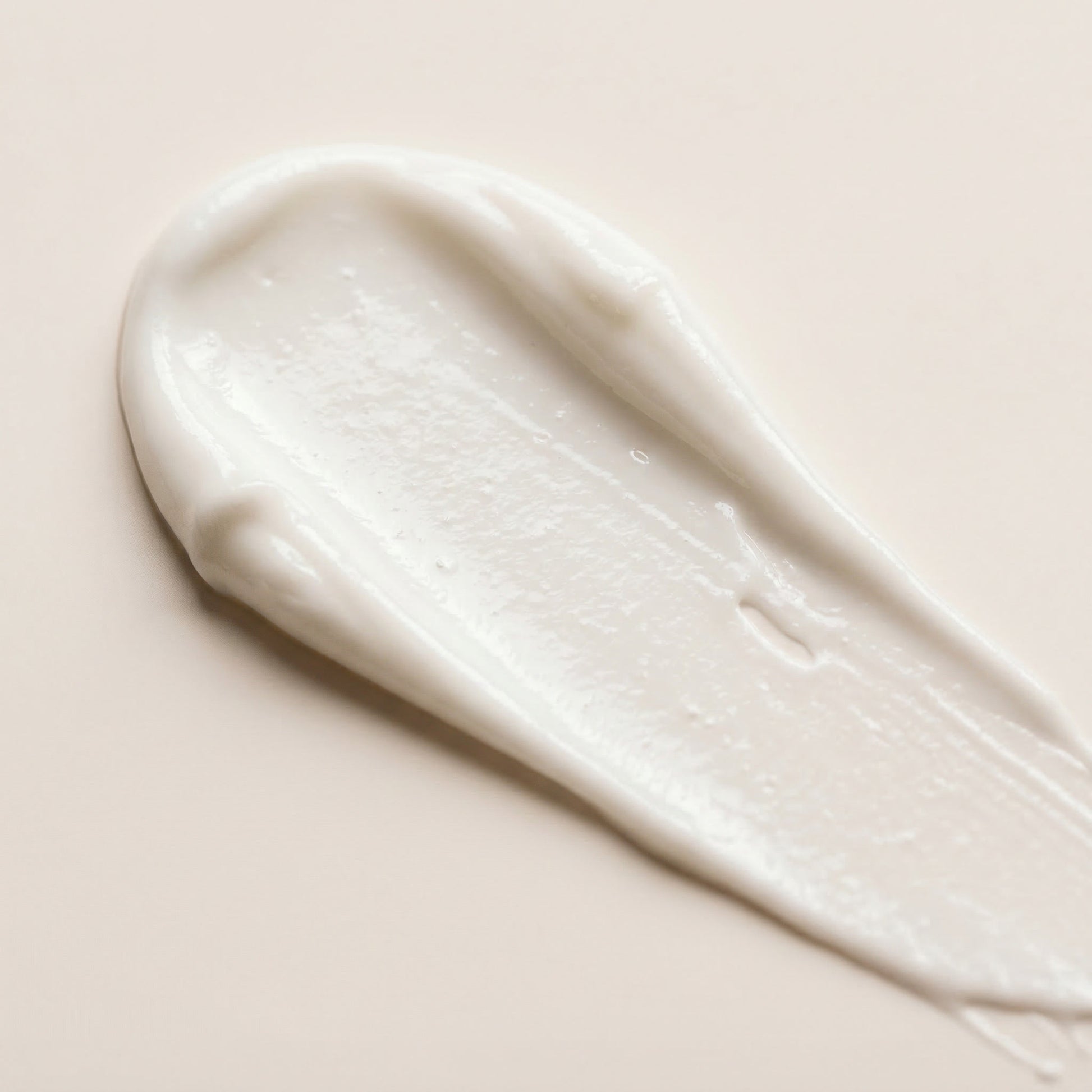 The Care Formula Renewal Barrier Cream with rich, nourishing white cream texture close-up