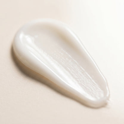 The Care Formula Renewal Eye Serum lightweight, silky white serum texture close-up